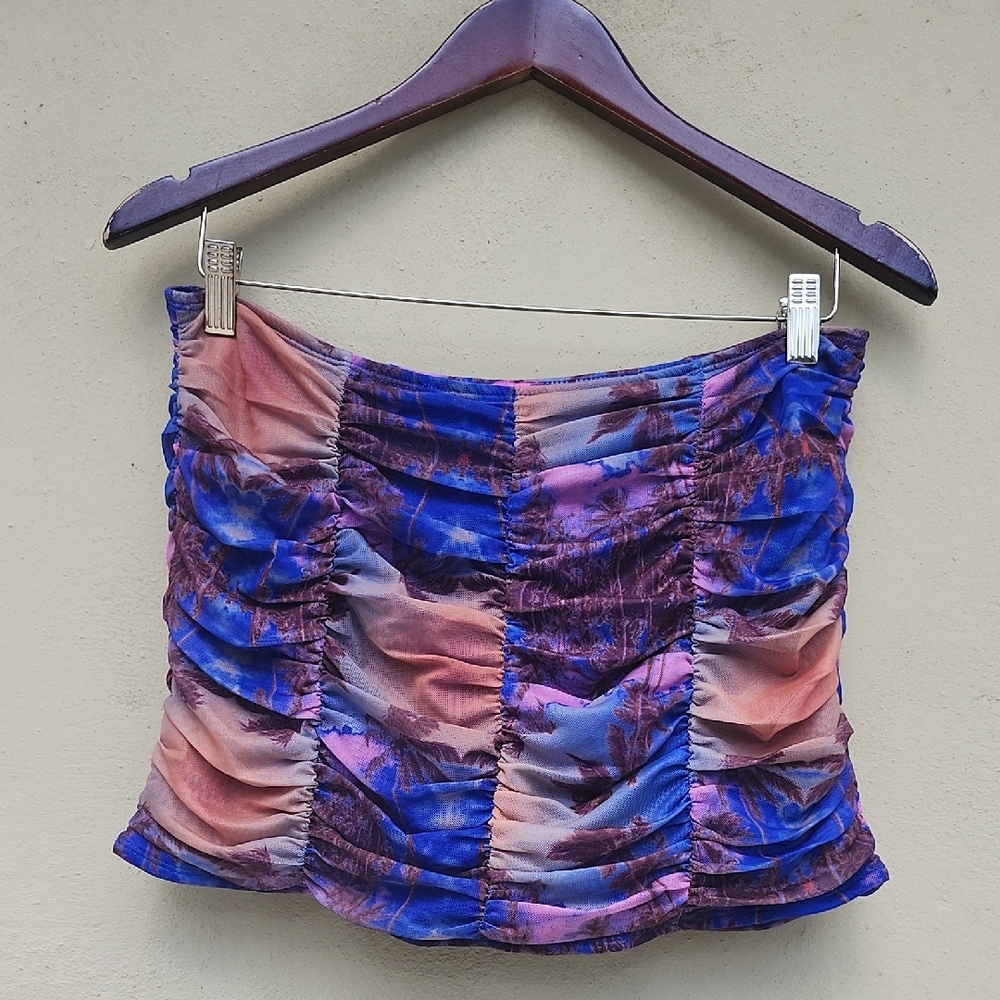 Edikted Pink Tag on Blue Fabric